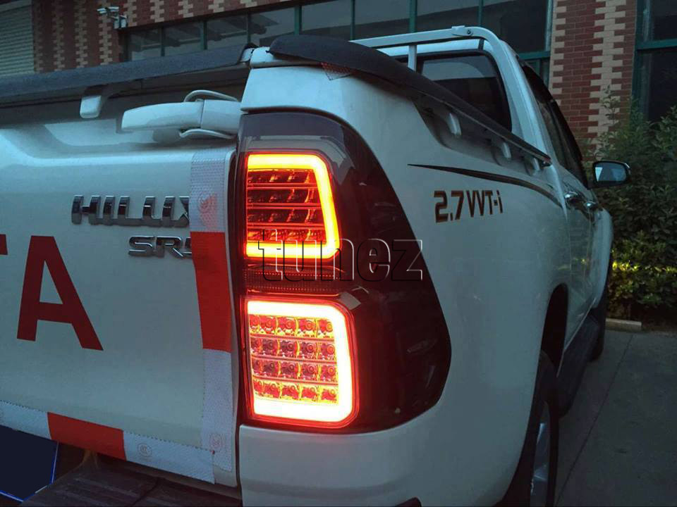 THL01 Toyota Hilux GUN AN120 AN130 8th Generation Gen 2015 2016 2017 2018 GUN SR SR5 Workmate Hi-Rider Smoked Brake Full LED Tail Rear Lamp Lights For Car Truck Smoke Autotunez Tunez Taillights Rear Lamp Light Aftermarket Pair OEM Turn Signal Reversing Compatible